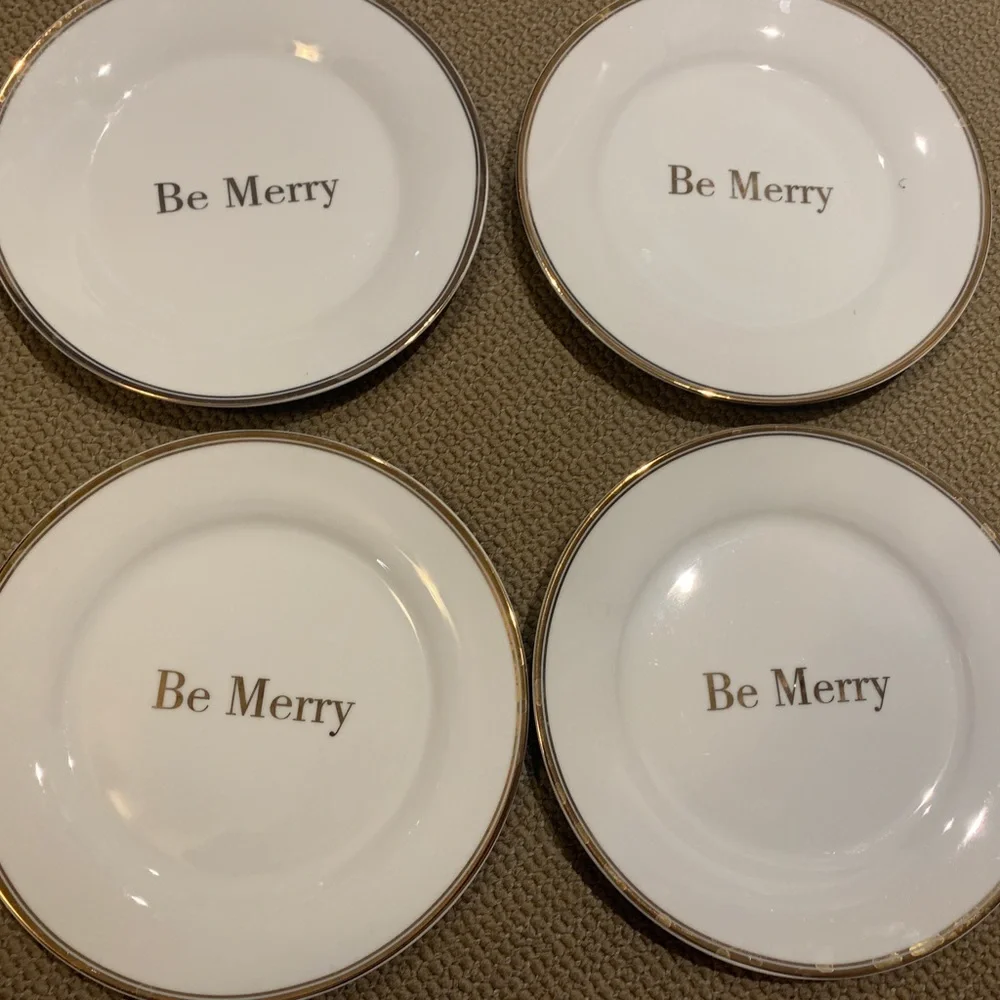 Four Williams Sonoma Be Merry plates